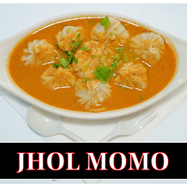Jhol Veg Momo (8pc).